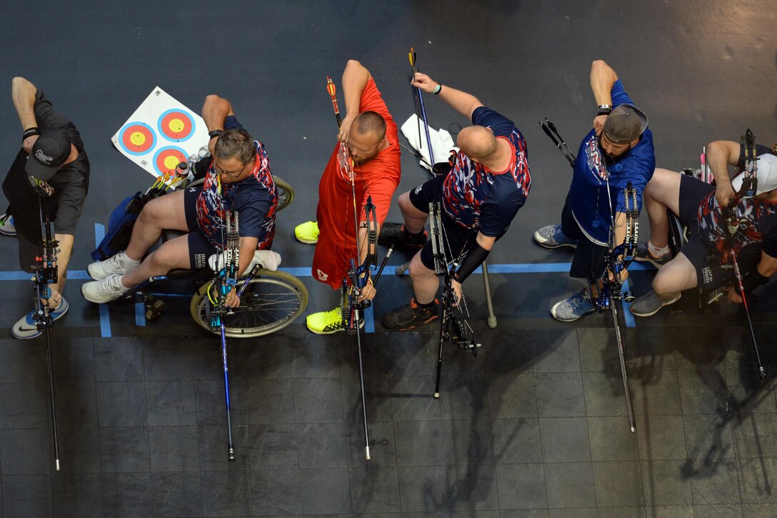 A line of archers compete in the 2016 Department of Defense Warrior Games at the U.S. Military Academy in West Point, N.Y., June 17, 2016. DoD photo by EJ Hersom