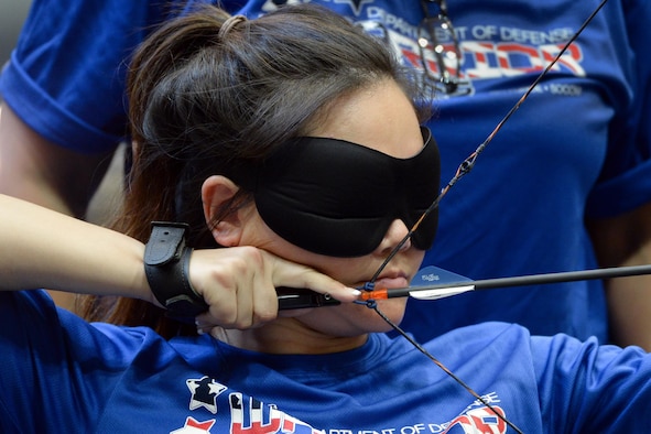 Air Force 1st Lt. Sarah Frankosky aims an arrow using sound during the visually impaired archery competition of the 2016 Department of Defense Warrior Games at the U.S. Military Academy in West Point, N.Y., June 17, 2016. DoD photo by EJ Hersom
