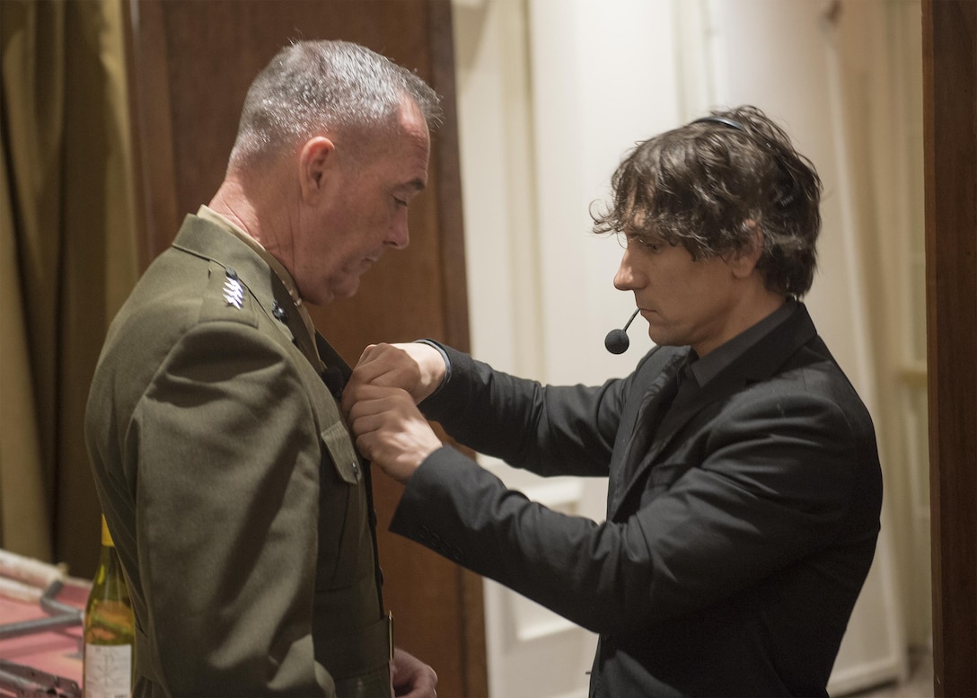 Marine Corps Gen. Joe Dunford, chairman of the Joint Chiefs of Staff, prepares for a discussion on defense challenges with NBC correspondent Andrea Mitchell at the Council on Foreign Relations in New York City, June 17, 2016. DoD photo by Navy Petty Officer 2nd Class Dominique A. Pineiro