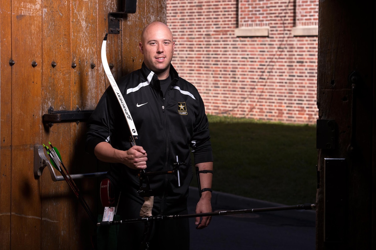 Army Sgt. Davey Jones earned a gold medal in discus June 16, 2016, during the Department of Defense Warrior Games at the U.S. Military Academy in West Point, N.Y. Jones, who is also an archer, is pictured with his competition bow, June 15, 2016. DoD photo by EJ Hersom