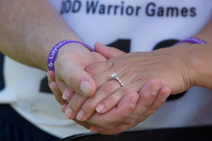 Marine Corps veteran Cpl. Rose Jessica Hammack shows her engagement ring with Navy veteran Andrew Johnson at the U.S. Military Academy in West Point, N.Y., June 16, 2016. Johnson proposed to Hammack during the 2016 Department of Defense Warrior Games, in which they are both competitors. DoD photo by EJ Hersom