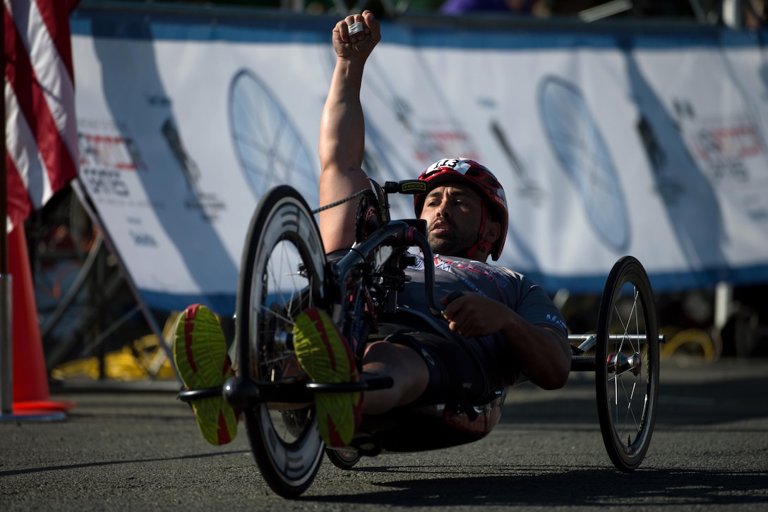 Army veteran Howard Sanborn of the Special Operations Command team reacts to being first to cross the finish line of the hand cyclists in the 2016 Department of Defense Warrior Games at the U.S. Military Academy in West Point, N.Y., June 18, 2016.DoD photo by EJ Hersom