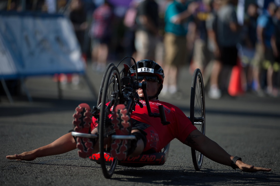Marine Corps veteran Gunnery Sgt. Anthony Rios finishes the hand cycle event of the 2016 Department of Defense Warrior Games at the U.S. Military Academy in West Point, N.Y., June 18, 2016. DoD photo by EJ Hersom