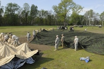 364th ESC Soldiers turn a field on a Polish military base near Warsaw into a tactical operations center. Nearly 200 Soldiers from the unit's headquarters worked and lived in expeditionary conditions for more than a month providing sustainment support to combat units during Anakonda 16 May 9 through June 17.