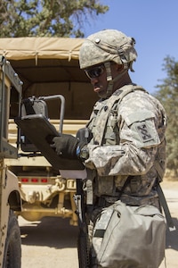 U.S. Army Reserve Spc. Jahvar Billings, 385th Transportation Detachment, Fort Bragg, N.C., verifies a trip ticket at Tactical Assembly Area Schoonover during Combat Support Training Exercise 91-16-02, Fort Hunter Liggett, Calif., June 15, 2016. As the largest U.S. Army Reserve training exercise, CSTX 91-16-02 provides Soldiers with unique opportunities to sharpen their technical and tactical skills in combat-like conditions. (Photo by U.S. Army Spc. Daisy Zimmer, 367th Mobile Public Affairs Detachment)