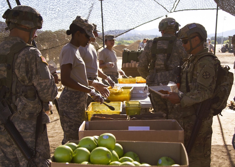 U.S. Army Reserve Culinary Specialists on Tactical Assembly Area Schoonover feed between 800-1,100 Soldiers daily and follow strict food handling procedures as part of Combat Support Training Exercise 91-16-02, Fort Hunter Liggett, Calif., June 18, 2016. As the largest U.S. Army Reserve training exercise, CSTX 91-16-02 provides Soldiers with unique opportunities to sharpen their technical and tactical skills in combat-like conditions. (U.S. Army photo by Spc. Daisy Zimmer, 367th Mobile Public Affairs Detachment)