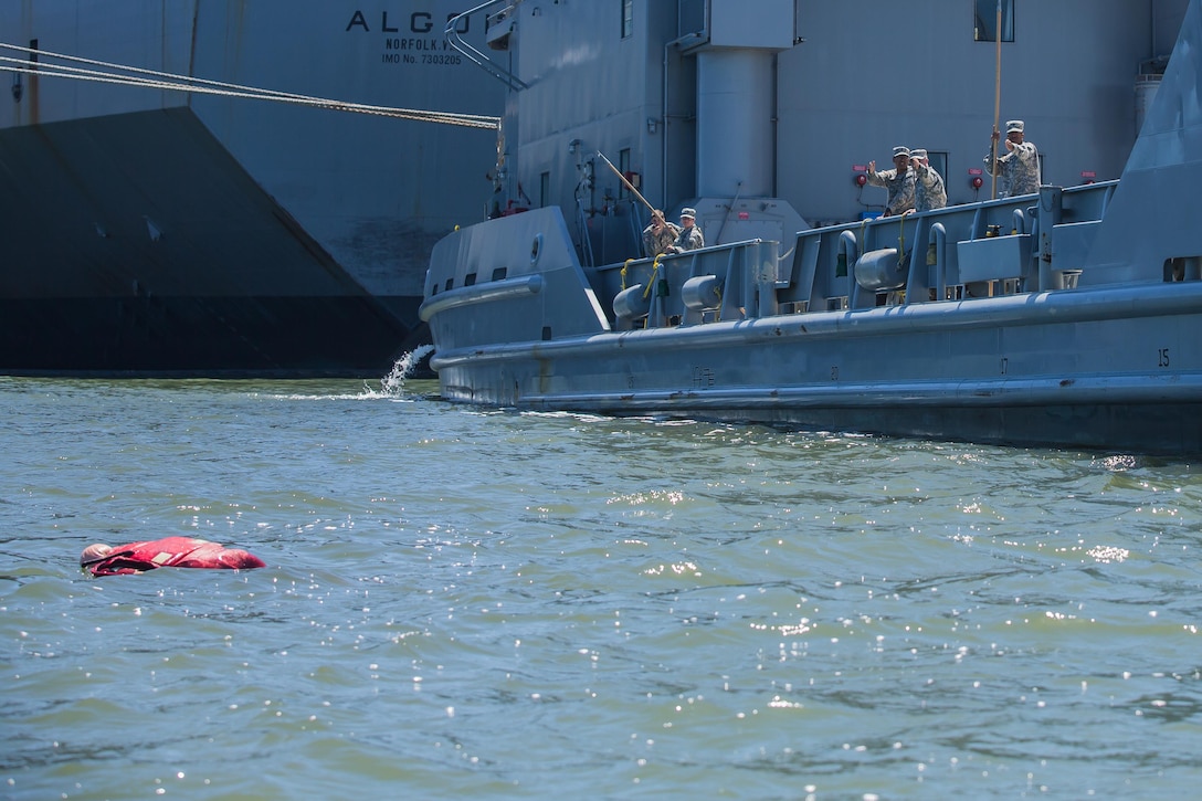 U.S. Army Reserve Soldiers of the 481st Transportation Company practice the "man-overboard" drill with a mannequin on landing craft utility 2000 USAV Palo Also during training at the Big Logistics Over The Shore, West exercises at Alameda, Calif., Aug. 3, 2015. Big Logistics Over-The-Shore, West is an annual, Army Reserve, multi-echelon functional exercise designed for transportation units and sustainment commands to hone their expertise in Logistics Over-the-Shore (LOTS) operations from July 25 to Aug. 7, 2015. More than 750 Soldiers are participating this year. The exercise has grown into a multi-component exercise involving elements from the Active Component Army, U.S. Navy, U.S. Air Force, U.S. Coast Guard, and U.S. Maritime Administration are conducting operations at three Bay-Area California training locations: Camp Parks, Alameda Point, and Military Ocean Terminal-Concord (MOTCO).
