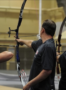 The 2016 DoD Warrior Games includes archery, both recurve bow, seen here, compound bow. Some injuries prohibit the athlete from using both hands when shooting. In true adaptive sport style, some of the archers adapt and overcome the loss of the use of a limb and pull the bow string back with their teeth as seen here. The Games, running from June 15-21,  are a Paralympic-type event for wounded, ill and injured personnel from the military representing all four U.S. Services, Special Operations Command and the United Kingdom.
