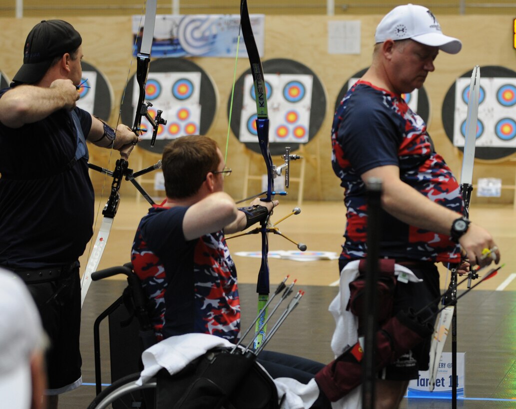 The 2016 DoD Warrior Games includes archery, both recurve bow, seen here, compound bow. The two competitors in the red, white abd blue shirts are from the United Kingdom team. The Games, running from June 15-21,  are a Paralympic-type event for wounded, ill and injured personnel from the military representing all four U.S. Services, Special Operations Command and the United Kingdom.