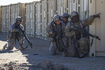 U.S. Army Reserve Soldiers, 1017th Quartermaster Company, Camp Pendleton, Calif., react to a simulated attack during a defense exercise at the Tactical Assembly Area Schoonover fuel point as part of Combat Support Training Exercise 91-16-02, Fort Hunter Liggett, Calif., June 17, 2016. As the largest U.S. Army Reserve training exercise, CSTX 91-16-02 provides Soldiers with unique opportunities to sharpen their technical and tactical skills in combat-like conditions. (U.S. Army photo by Spc. Daisy Zimmer, 367th Mobile Public Affairs Detachment)