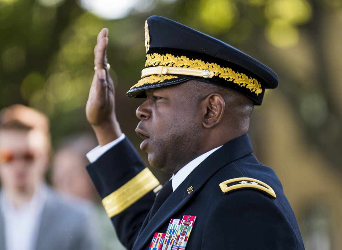 Maj. Gen. Phillip Churn, commanding general of the 200th Military Police Command, U.S. Army Reserve, a native of Washington, D.C., administers the Oath of Commissioned Officers to a group of six midshipmen commissioning into the U.S. Army at the U.S. Merchant Marine Academy in Kings Point, New York, during a private commissioning ceremony June 18. The 2016 graduating class included 229 senior midshipmen, each earning a Bachelor of Science degree, a direct commission into the armed forces and a U.S. Coast Guard license. (U.S. Army photo by Master Sgt. Michel Sauret)