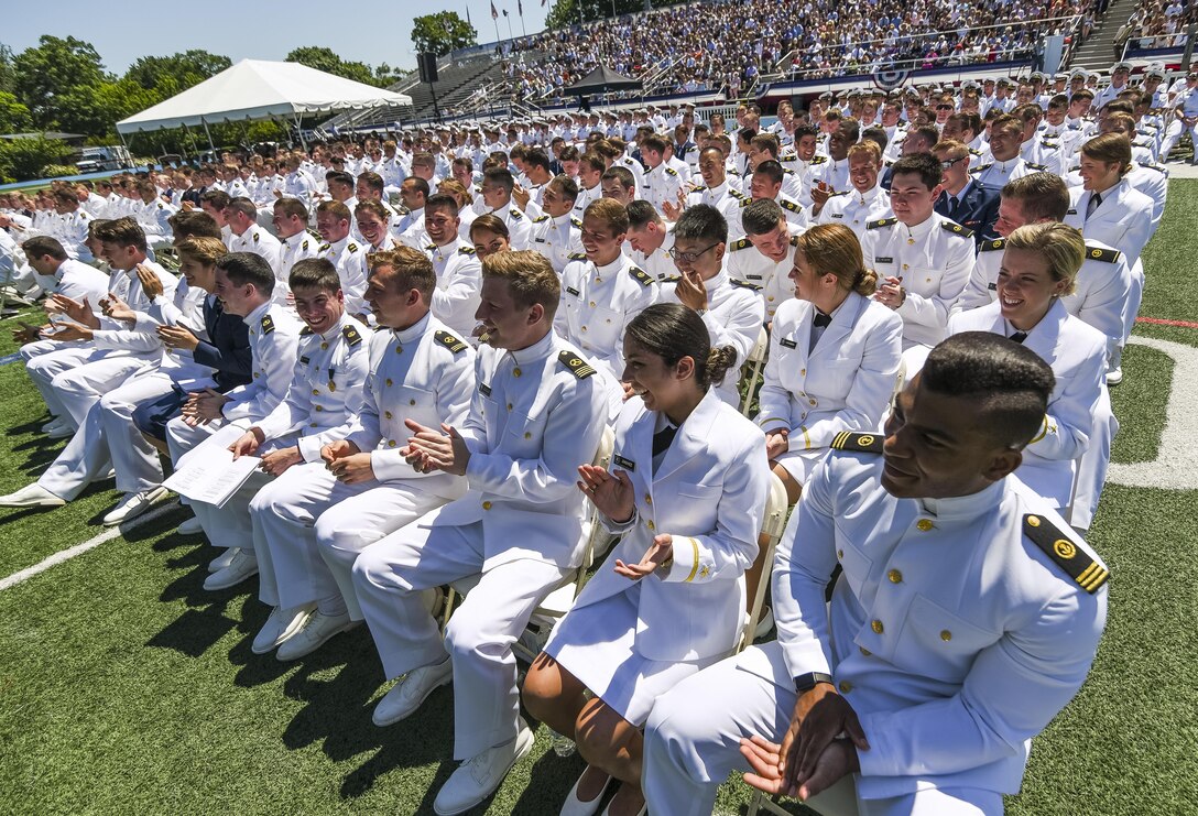 The 2016 graduating class of Kings Pointers applaud during their graduation ceremony at the U.S. Merchant Marine Academy in Kings Point, New York, June 18. Maj. Gen. Phillip Churn, commanding general of the 200th Military Police Command, U.S. Army Reserve, a native of Washington, D.C., administered the Oath of Commissioned Officers for six Army lieutenants. The 2016 graduating class included 229 senior midshipmen, each earning a Bachelor of Science degree, a direct commission into the armed forces and a U.S. Coast Guard license. (U.S. Army photo by Master Sgt. Michel Sauret)