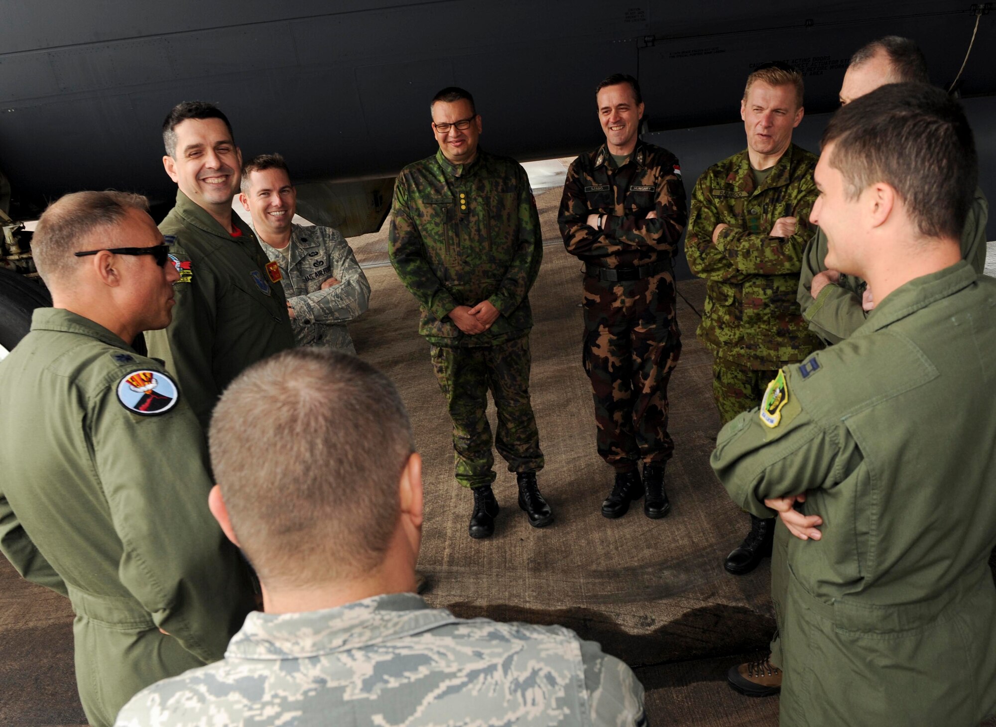 Fifth Expeditionary Operations Group leadership and Defense Attaché members discuss the B-52H Stratofortress at RAF Fairford, United Kingdom, June 17, 2016. More than 250 Airmen are currently deployed to Fairford to support multinational exercises BALTOPS 16 and Saber Strike 16. (U.S. Air Force photo/Senior Airman Sahara. L. Fales)