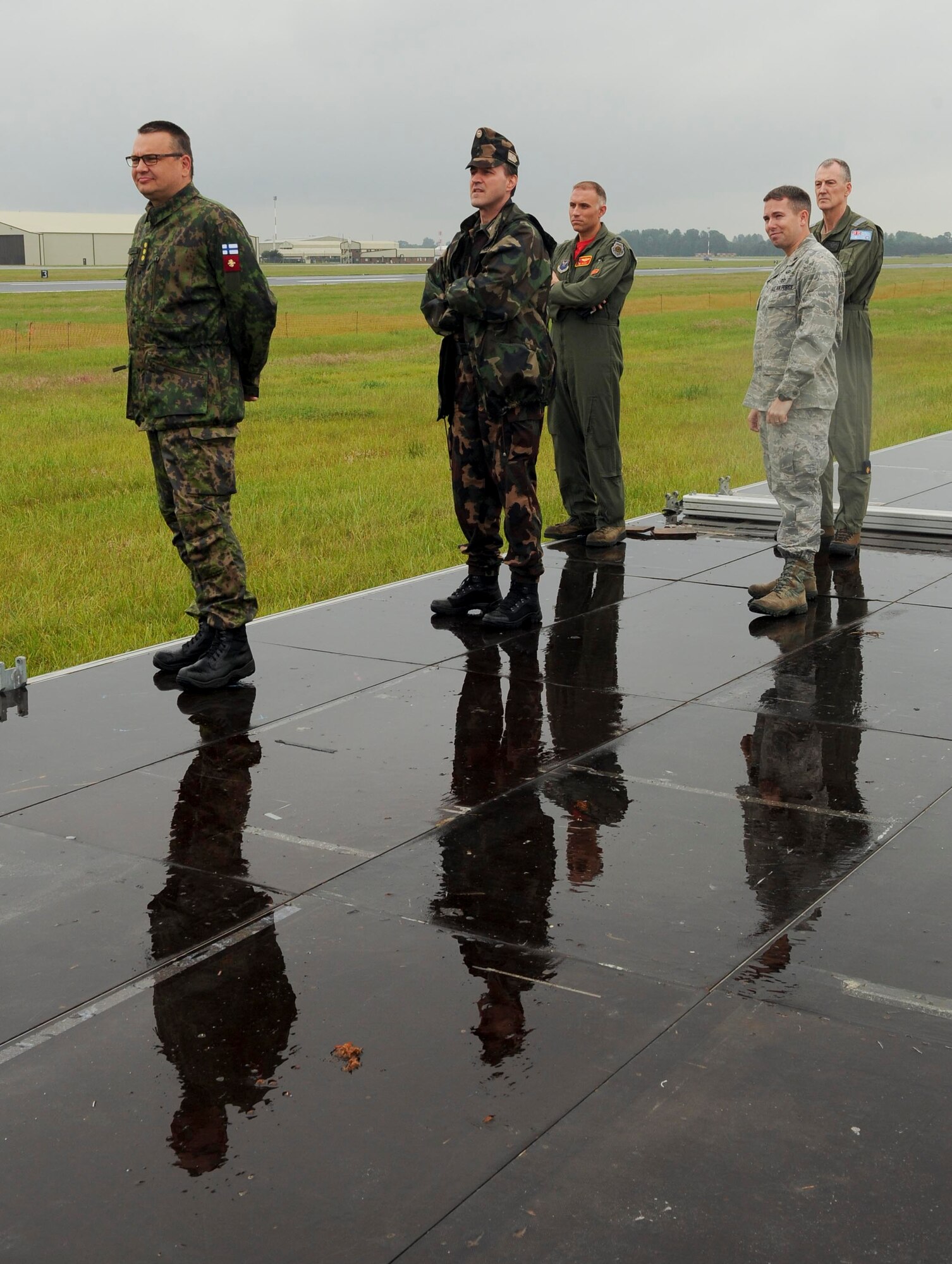 Defense attaché members watch a B-52H Stratofortress take off during a Saber Strike 16 training exercise at RAF Fairford, United Kingdom, June 17, 2016. The B-52 carries a diverse weapon payload, which can total up to 70,000 pounds. (U.S. Air Force photo/Senior Airman Sahara. L. Fales)