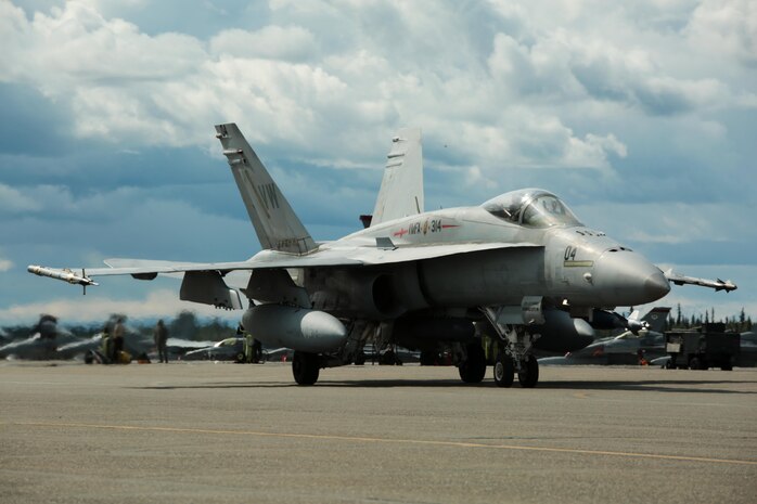 A U.S. Marine Corps F/A-18C Hornet aircraft with Marine Fighter Attack Squadron (VMFA) 314, stationed at Marine Corps Air Station Miramar, California, taxis down the runway at Eielson Air Force Base, Alaska, during its participation in Red Flag-Alaska 16-2, June 7, 2016. Red Flag-Alaska 16-2 provides squadrons the opportunity to train with joint and international units, increasing their combat skills by participating in simulated combat situations in a realistic threat environment. (U.S. Marine Corps photo by Lance Cpl. Donato Maffin/Released)