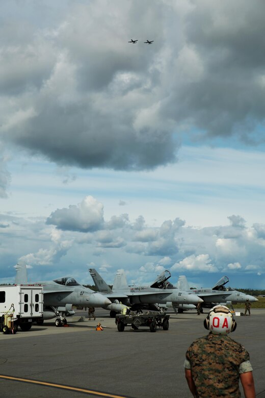 U.S. Marine Corps F/A-18C Hornet aircraft with Marine Fighter Attack Squadron (VMFA) 314, stationed at Marine Corps Air Station Miramar, California, stage for a mission at Eielson Air Force Base, Alaska, during its participation in Red Flag-Alaska 16-2, June 7, 2016. Red Flag-Alaska 16-2 provides squadrons the opportunity to train with joint and international units, increasing their combat skills by participating in simulated combat situations in a realistic threat environment. (U.S. Marine Corps photo by Lance Cpl. Donato Maffin/Released)