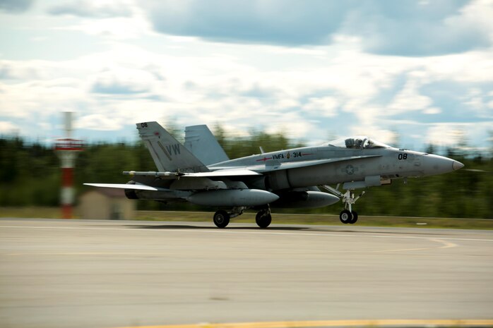 A U.S. Marine Corps F/A-18C Hornet aircraft with Marine Fighter Attack Squadron (VMFA) 314, stationed at Marine Corps Air Station Miramar, California, takes-off from the runway at Eielson Air Force Base, Alaska, during its participation in Red Flag-Alaska 16-2, June 7, 2016. Red Flag-Alaska 16-2 provides squadrons the opportunity to train with joint and international units, increasing their combat skills by participating in simulated combat situations in a realistic threat environment. (U.S. Marine Corps photo by Lance Cpl. Donato Maffin/Released)