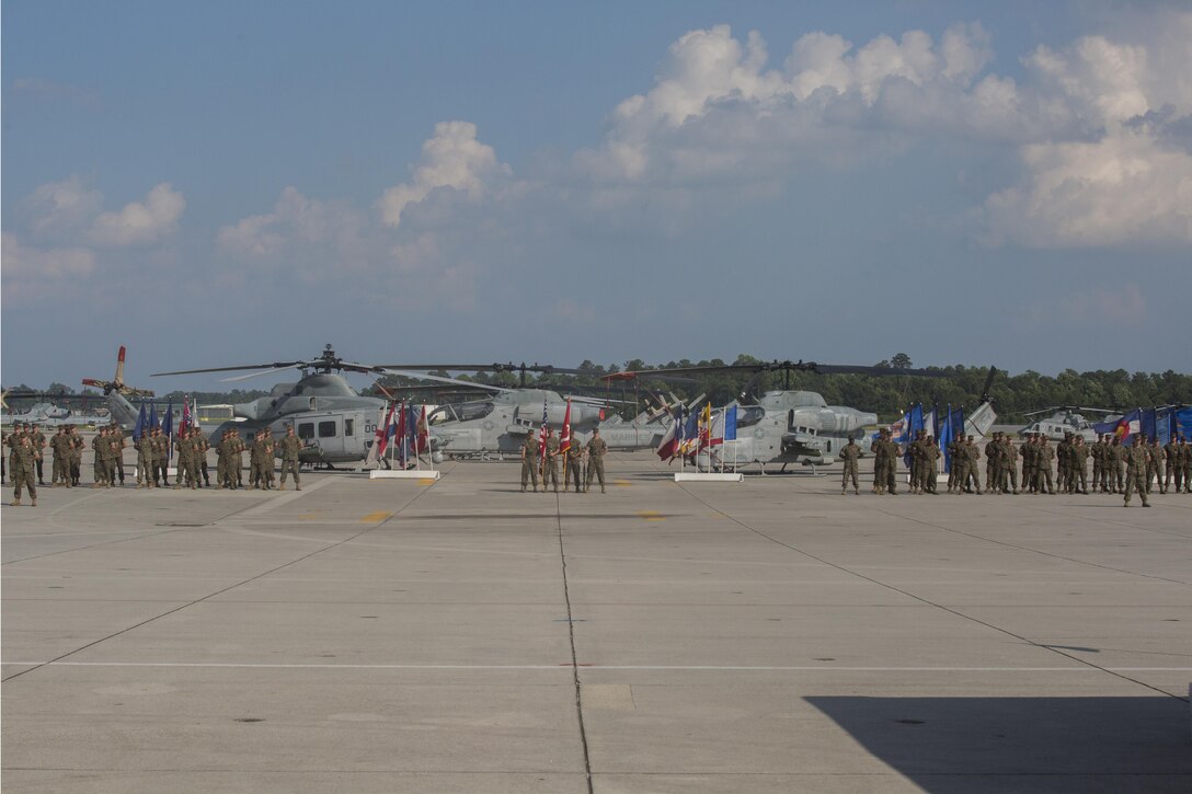 Marine Light Helicopter Attack Squadron stands in formation during its deactivation ceremony at Marine Corps Air Station New River, N.C., June 16, 2016. After eight years of service under 2nd Marine Air Wing and supporting the global war on terror, the unit will disband and Marines will scatter throughout various other attack squadrons throughout the Marine Corps.