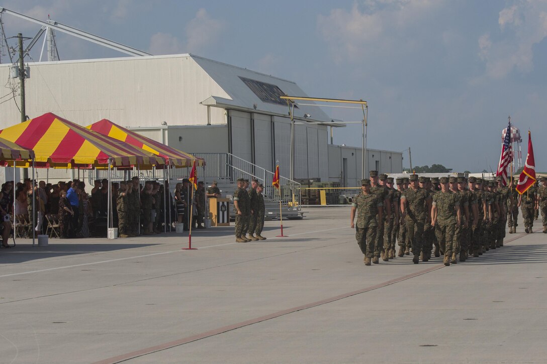 Marines with Marine Light Attack Helicopter Squadron 467 pass in review by family and friends during the squadron's deactivation ceremony at Marine Corps Air Station New River, N.C., June 16, 2016. Activated in 2008 in support of the global war on terror, the squadron successfully executed their mission while providing security to ground troops during Operation Enduring Freedom in Afghanistan.
