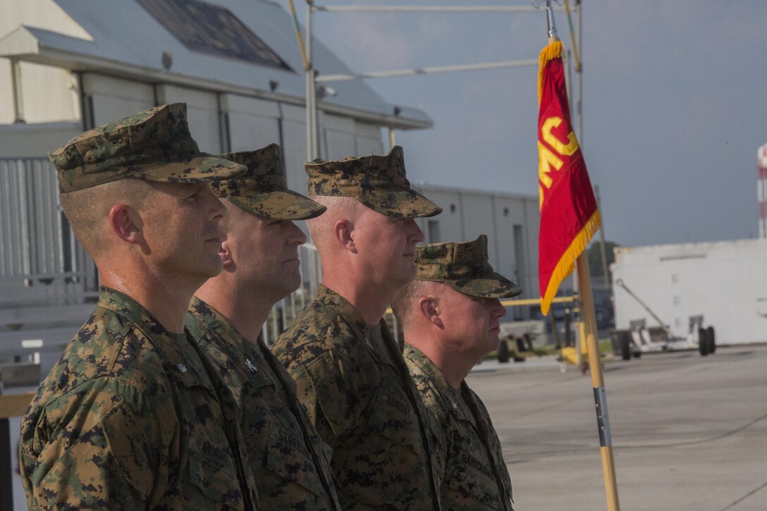 Lieutenant colonel David B. Moore, (left), the commanding officer of Marine Light Attack Helicopter Squadron 467, stands alongside past commanding officers of the squadron during its deactivation ceremony at Marine Corps Air Station New River, N.C., June 16, 2016. The squadron served in numerous theaters to include supporting unit deployment programs in Japan, attaching to Marine Expeditionary Units, and providing security to ground troops during Operation Enduring Freedom in Afghanistan.