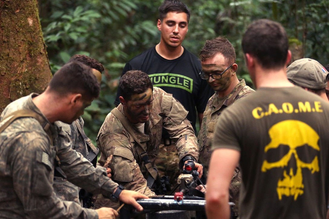 U.S. soldiers set improvised jungle security measures at the French jungle warfare school in Gabon, June 10, 2016. Army photo by Sgt. Henrique Luiz de Holleben