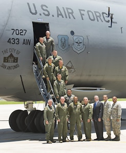 Aircrew from the 433rd Airlift Wing and Lockheed Martin representatives pose for a photo after the maiden flight of the first C-5M Super Galaxy aircraft, "The City of San Antonio" to be received by the Air Force Reserve Command June 17, 2016 at Joint Base San Antonio-Lackland, Texas. The 433rd AW will receive a total of nine C-5M models which is the result of a two-phase modernization effort that will improve fuel savings, climb rate, payload capability, and noise reduction. (U.S. Air Force photo/Benjamin Faske)