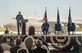 Col. Thomas K. Smith Jr., the 433rd Airlift Wing commander, addresses a crowd during the C-5M Super Galaxy transfer ceremony June 17, 2016, along the flightline of Joint Base San Antonio-Lackland, Texas. The C-5M, dubbed "The City of San Antonio," is the first one to be delivered to a Reserve unit. (U.S. Air Force photo/Benjamin Faske)