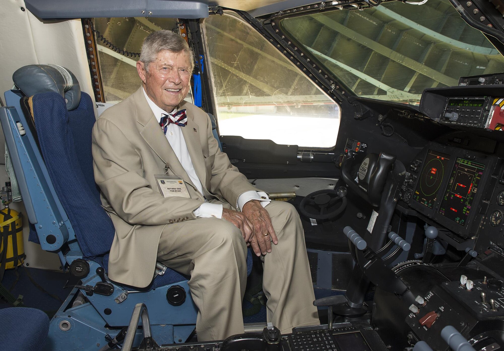 Retired Gen. Thomas M. Ryan, former Military Airlift Command commander, poses for a photo in the cockpit of the new C-5M Super Galaxy aircraft, bestowed "The City of San Antonio" June 17, 2016 at Joint Base San Antonio-Lackland, Texas. Ryan piloted the Alamo Wing's first C-5A Galaxy aircraft from Norton Air Force Base, California, to Kelly Air Force Base, Texas, on Nov. 30, 1984. The wing's first C-5A Galaxy of 32 years ago was also bestowed "The City of San Antonio," in a similar ceremony.(U.S. Air Force photo by Benjamin Faske) 