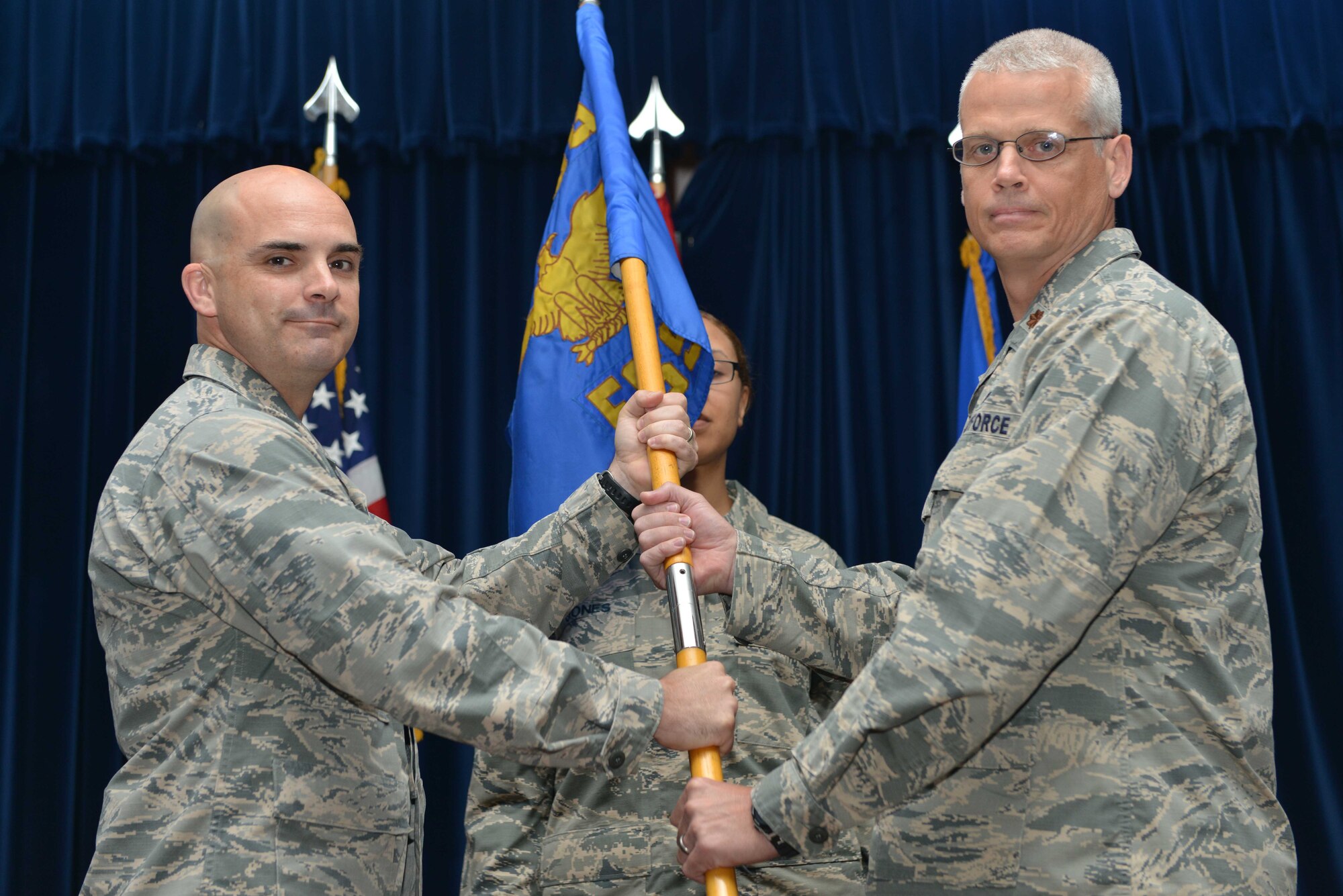 U.S. Air Force Maj. Kenneth Raszinski, 39th Force Support Squadron incoming commander, receives command from U.S. Air Force Col. Russell Voce, 39th Mission Support Group commander, during a change of command ceremony June 20, 2016, at Incirlik Air Base, Turkey. Prior to taking command, Raszinski was the 8th FSS operations officer at Kunsan Air Base, Republic of Korea. (U.S. Air Force photo by Senior Airman John Nieves Camacho/Released)