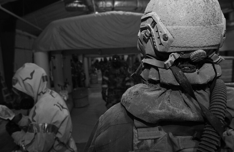 Aircrew members process through a simulated decontamination line at Hurlburt Field, Fla., June 9, 2016.(U.S. Air Force photo / Staff Sgt. Melanie Holochwost)