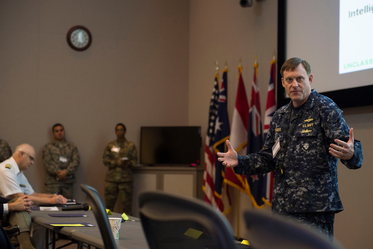 Navy Adm. Michael S. Rogers, who commands U.S. Cyber Command and also directs the National Security Agency and serves as chief of the Central Security Service, speaks to exercise Cyber Guard 2016 visitors in Suffolk, Va., June 16, 2016. Navy photo by Petty Officer 2nd Class Jesse Hyatt