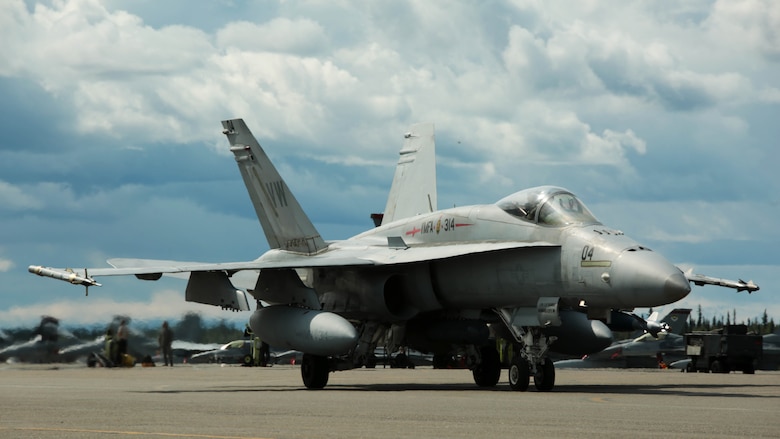 A U.S. Marine Corps F/A-18C Hornet aircraft with Marine Fighter Attack Squadron (VMFA) 314, stationed at Marine Corps Air Station Miramar, California, taxis down the runway at Eielson Air Force Base, Alaska, during its participation in Red Flag-Alaska 16-2, June 7, 2016. Red Flag-Alaska 16-2 provides squadrons the opportunity to train with joint and international units, increasing their combat skills by participating in simulated combat situations in a realistic threat environment. 
