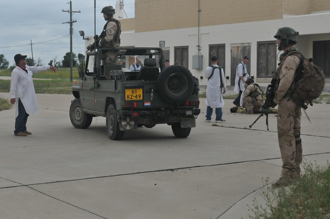 FORT HOOD, TEXAS – A task force of Dutch Soldiers with the 302nd Royal Netherlands Aviation Squadron trekked across rugged terrain and through an ever-changing climate during training exercises held mid-May at Fort Hood, Texas. The Dutch Soldiers were given a plethora of different missions to accomplish throughout the exercise including establishing a command post, conducting night operations, providing fire support, evacuating casualties, and interacting with the local populace in helping solve local issues.The exercise consisted of primarily Dutch forces however U.S. Soldiers and civilians provided support and aided in the role-play of opposing forces to make the event more realistic