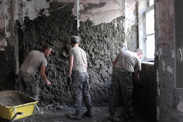 Airmen from the Kentucky Air National Guard’s 123rd Civil Engineer Squadron work on the walls of a kitchen at a school in Chisinau, Moldova, June 6, 2016. More than 35 Airmen from the unit renovated the institution, which is the only school in Moldova specifically for deaf and special-needs students. The humanitarian project was a partnership with the Office of Defense Cooperation and U.S. European Command, with funds being provided by the National Guard Bureau. (U.S. Air National Guard photo/Tech. Sgt. Vicky Spesard)
