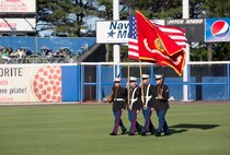 NORFOLK, Va. - Marines with U.S. Marine Corps Forces Command serve as the color guard during the Norfolk Tides' Marine Night, June 18. Marine Night was held in honor of the brave men and woman who have served, are currently serving in the Marine Corps and those who paid the ultimate sacrifice. (U.S. Marine Corps photo by Cpl. Logan Snyder)