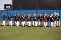 NORFOLK, Va. – The United States Marine Corps Silent Drill Platoon performs during pregame activities of the Norfolk Tides’ Marine Night, June 18. The silent drill platoon is stationed in Washington D.C., and travels the country performing at various events. Marine Night was held in honor of the brave men and women who have served, are currently serving in the Marine Corps and those who paid the ultimate sacrifice.  (U.S. Marine Corps photo by Cpl. Logan Snyder)