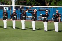 NORFOLK, Va. – The United States Marine Corps Silent Drill Platoon performs during pregame activities of the Norfolk Tides’ Marine Night, June 18. The silent drill platoon is stationed in Washington D.C., and travels the country performing at various events. Marine Night was held in honor of the brave men and women who have served, are currently serving in the Marine Corps and those who paid the ultimate sacrifice.  (U.S. Marine Corps photo by Cpl. Logan Snyder)