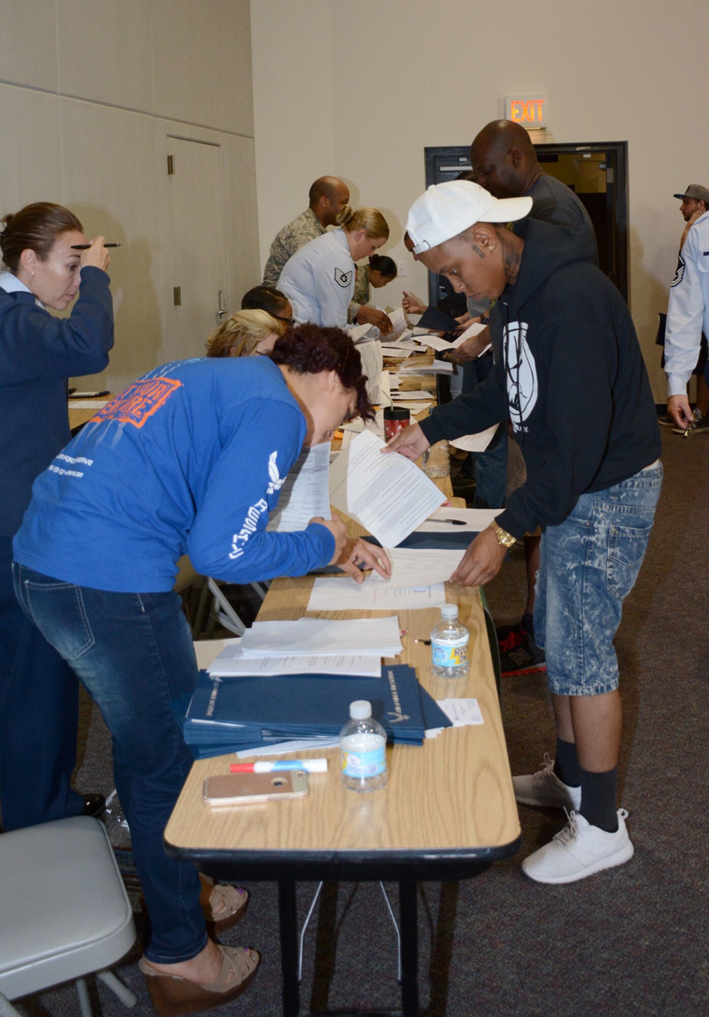 Individual Readiness Reserve members sign in during an IRR muster June 4, 2016 at Travis Air Force Base, Calif. IRR musters fall under the jurisdiction of the Air Force Personnel Center but rely heavily on the support of the event's host units. (U.S. Air Force photo/Senior Airman Shelby R. Horn)