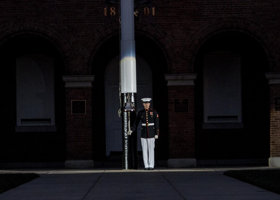 A Marine from Marine Barracks Washington, D.C., performs during the Friday Evening Parade, Jun. 17, 2016. The guest of honor for the parade was the Gen. Mark A. Welsh III, chief of staff of the United States Air Force, and the hosting official was Gen. Robert B. Neller, commandant of the Marine Corps. (Official Marine Corps photo by Staff Sgt. Michael Coleman/Released)
