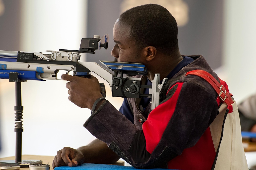 Navy veteran Henry Sawyer aims his air rifle during a shooting competition as part of the 2016 Department of Defense Warrior Games at the U.S. Military Academy in West Point, N.Y., June 19, 2016. DoD photo by EJ Hersom