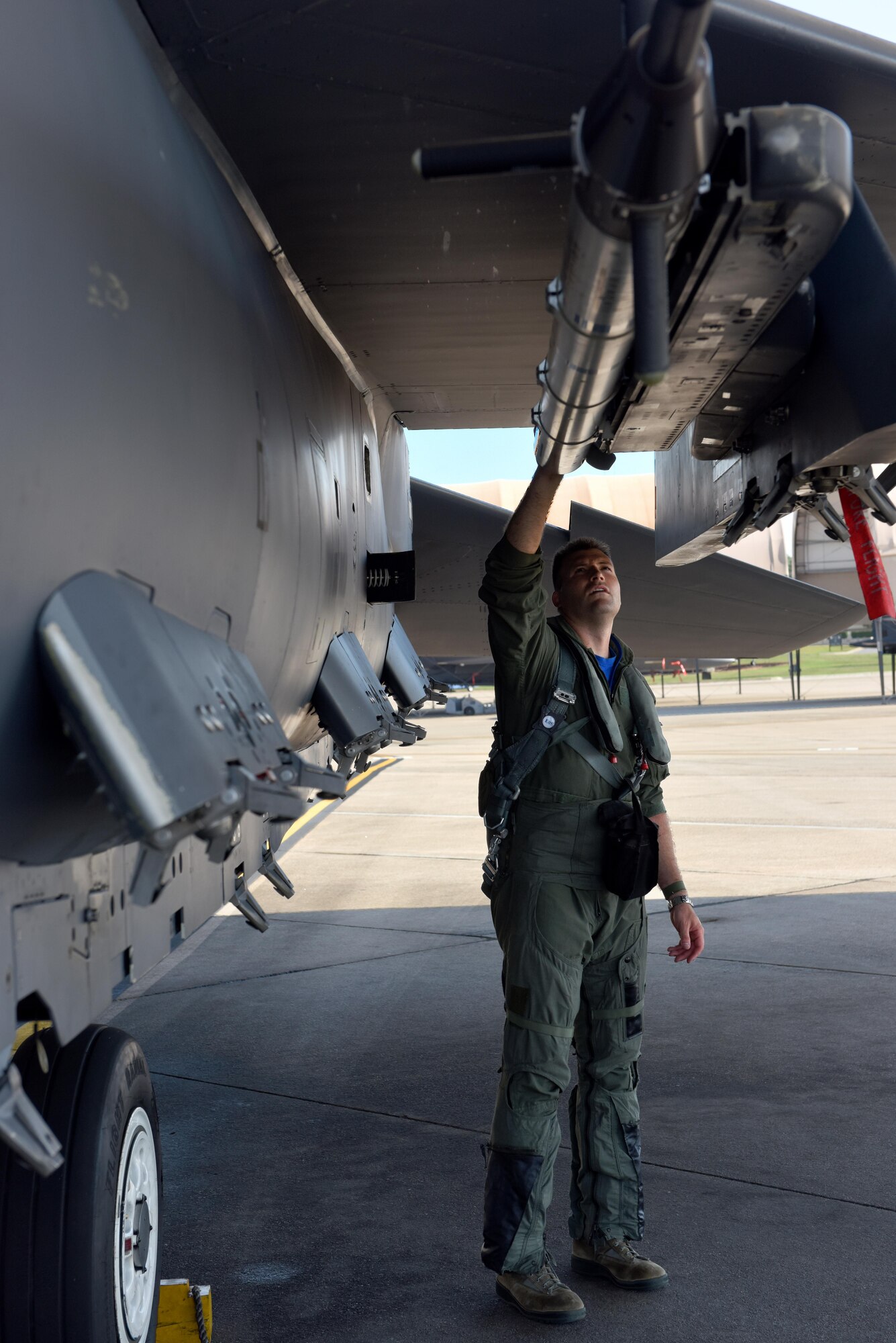 Lt. Col. Eric Schmidt, 334th Fighter Squadron director of operations, performs a pre-flight inspection June 17, 2016, at Seymour Johnson Air Force Base, North Carolina. Schmidt flew his final mission in the F-15E Strike Eagle, eclipsing 3,000 hours in the process. (U.S. Air Force photo/Tech. Sgt. Chuck Broadway)