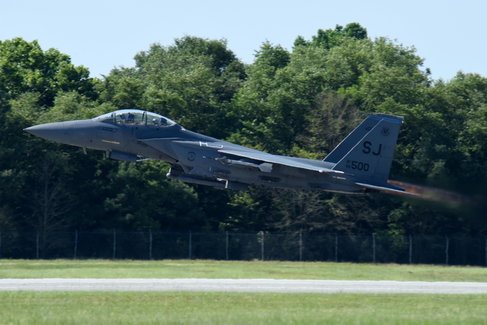 Lt. Col. Eric Schmidt, 334th Fighter Squadron director of operations and pilot, and Maj. Timothy Foery, 334th FS weapon systems officer, take off for a flight in the F-15E Strike Eagle June 17, 2016, at Seymour Johnson Air Force Base, North Carolina. Schmidt was completing his final flight in the aircraft, also surpassing 3,000 hours during the same flight. (U.S. Air Force photo/Tech. Sgt. Chuck Broadway)