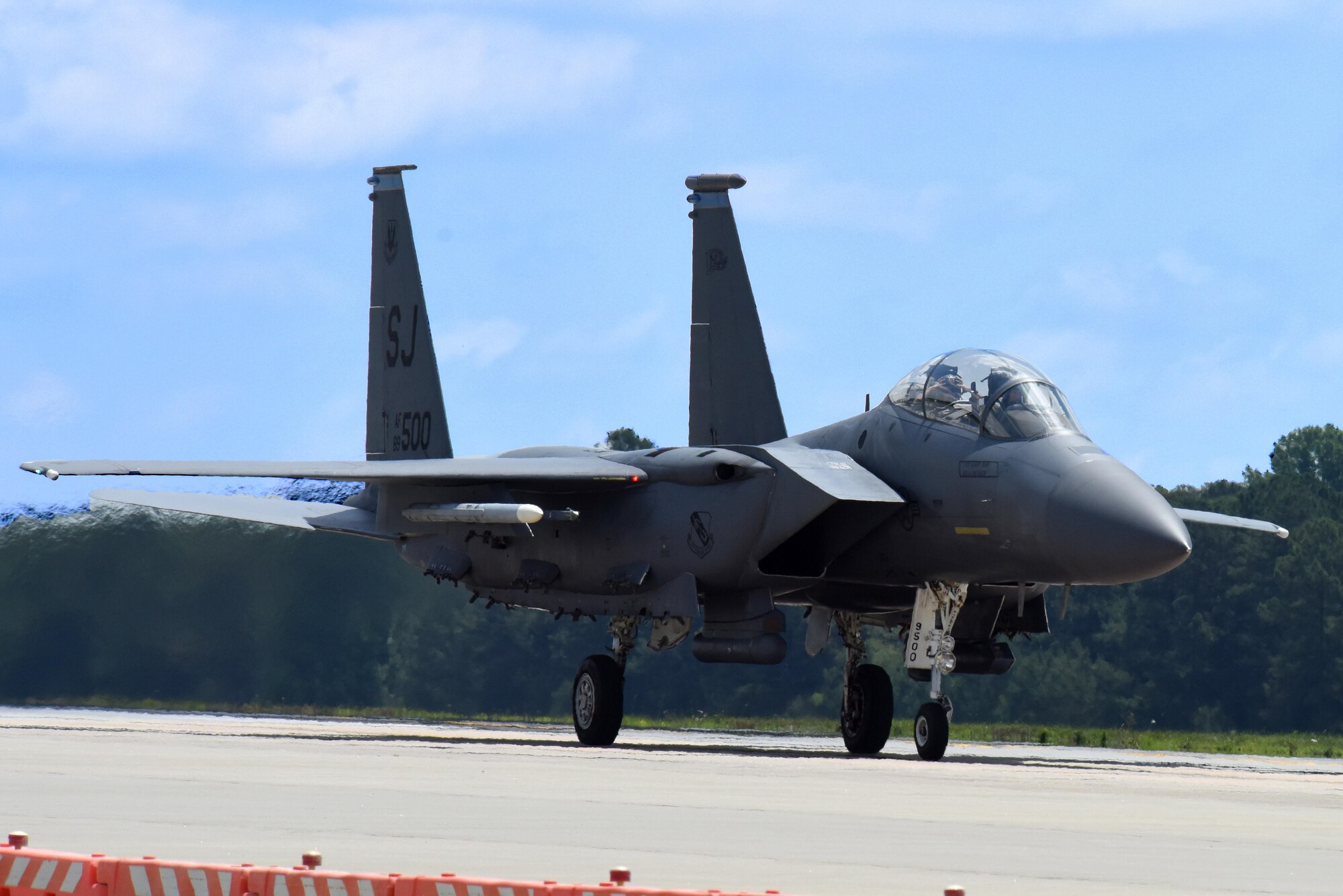 Lt. Col. Eric Schmidt, 334th Fighter Squadron director of operations and pilot, and Maj. Timothy Foery, 334th FS weapon systems officer taxi following an F-15E Strike Eagle flight June 17, 2016, at Seymour Johnson Air Force Base, North Carolina. Schmidt completed his final flight in the aircraft before moving to Vance AFB, Oklahoma to be a T-38 Talon instructor pilot. (U.S. Air Force photo/Tech. Sgt. Chuck Broadway)