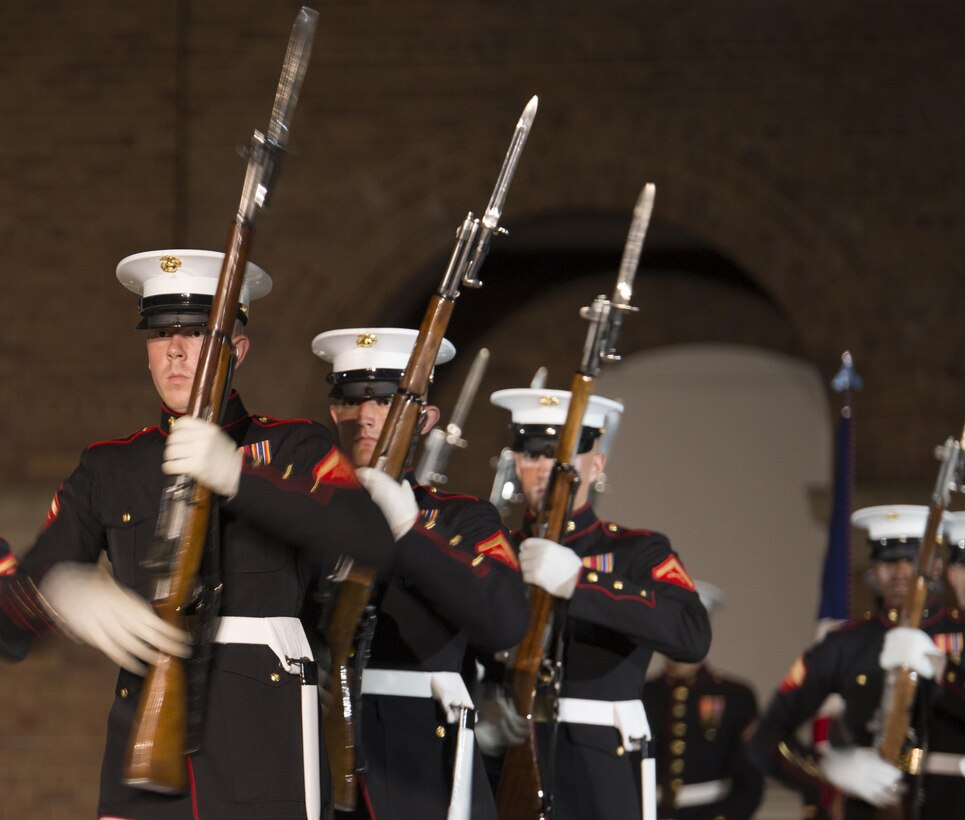 U.S. Marines from the Marine Corps Silent Drill Platoon perform during an Evening Parade at Marine Barracks, Washington, D.C., (“8th & I”), June 3, 2016. 