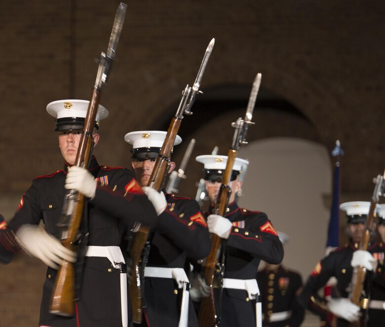 U.S. Marines from the Marine Corps Silent Drill Platoon perform during an Evening Parade at Marine Barracks, Washington, D.C., (“8th & I”), June 3, 2016. 