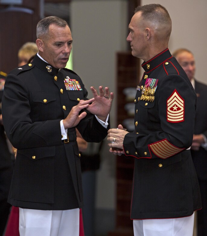 Commanding General, 4th Marine Division Brig. Gen. Paul Lebidine (left) speaks with Sergeant Major, Marine Forces Reserve Sgt. Maj. Patrick Kimble at a reception in Truman-Crawford Hall prior to the Evening Parade at Marine Barracks, Washington, D.C., (“8th & I”), June 3, 2016. 