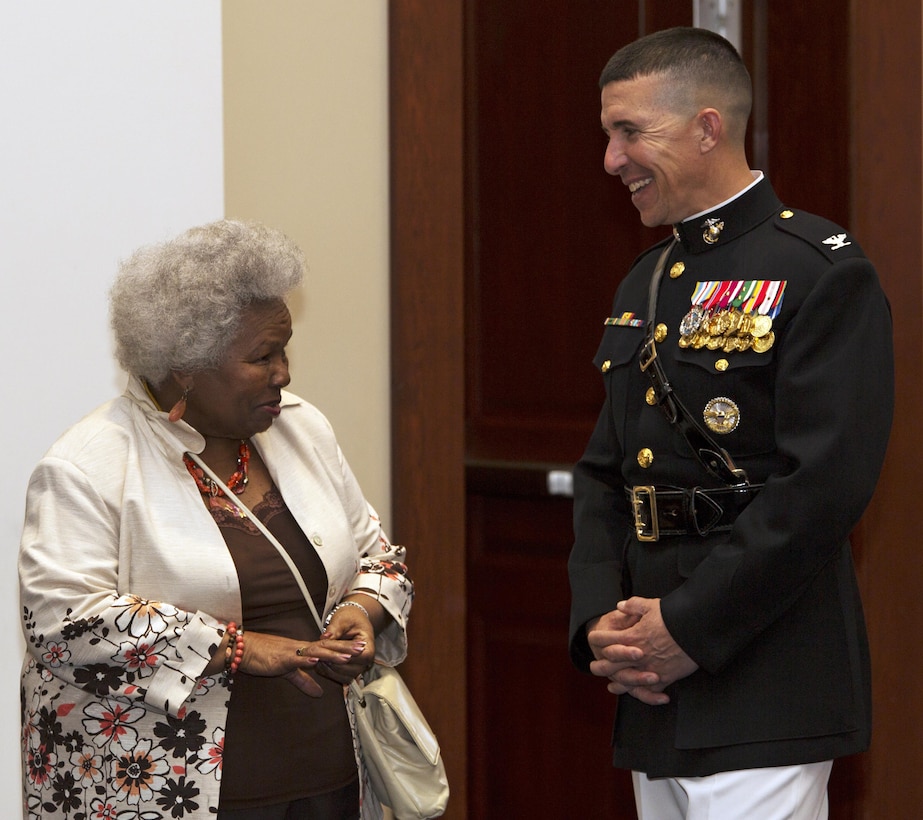 Commanding Officer, Marine Barracks Washington Col. Ben Watson (right) shares a laugh with Mrs. Martha Bailey, mother of Deputy Commandant, Plans Policies & Operations Lt. Gen. Ronald Bailey, during a reception in Truman-Crawford Hall prior to the Evening Parade at Marine Barracks, Washington, D.C., (“8th & I”), June 3, 2016. 