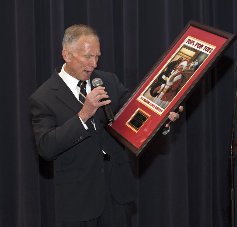 Toys for Tots Director Lt. Gen. Pete Osmand, USMC (Ret.) addresses attendees of a reception in Truman-Crawford Hall prior to an Evening Parade at Marine Barracks, Washington, D.C., (“8th & I”), June 3, 2016. 