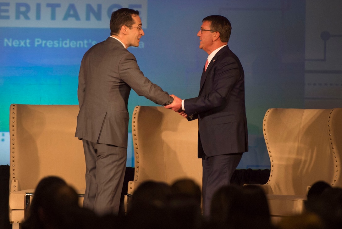 Richard Fontaine, left, president of the Center for a New American Security, welcomes Defense Secretary Ash Carter on stage to deliver keynote remarks at the center's annual conference in Washington, D.C., June 20, 2016. DoD photo by Air Force Senior Master Sgt. Adrian Cadiz