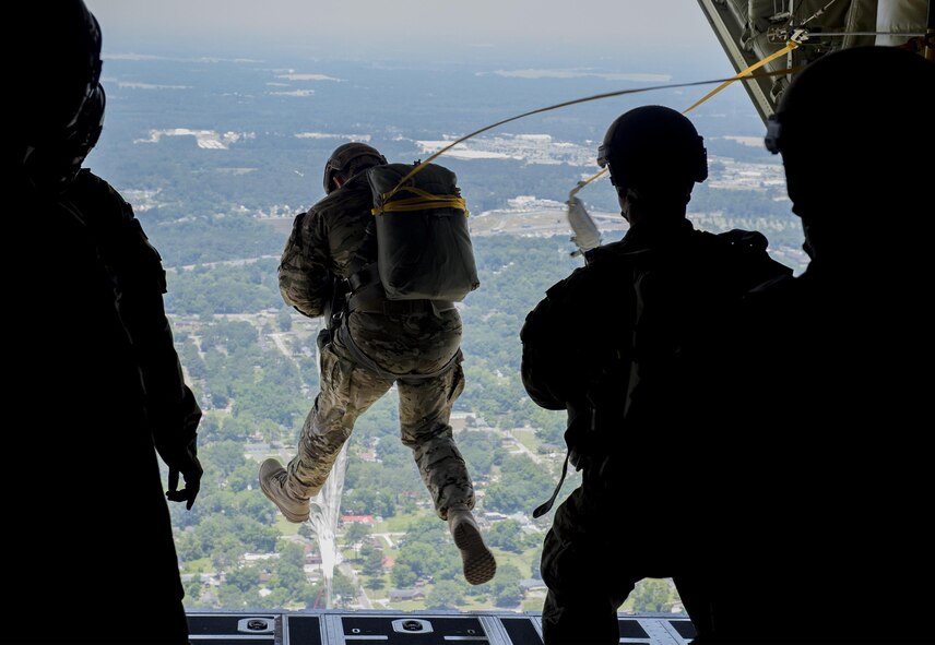 A U.S. Air Force Airman from the 93d Air Ground Operations Wing, jumps out of an HC-130J Combat King II, June 17, 2016 over the Lee Fulp drop zone in Tifton, Ga. The wing consists of three groups with more than 2,800 Battlefield Airmen at 20 locations throughout the continental United States. (U.S. Air Force photo by Tech. Sgt. Zachary Wolf/Released)